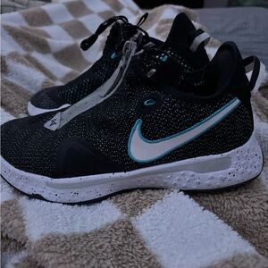 Nike Black and White Athletic Shoes with Blue Accents